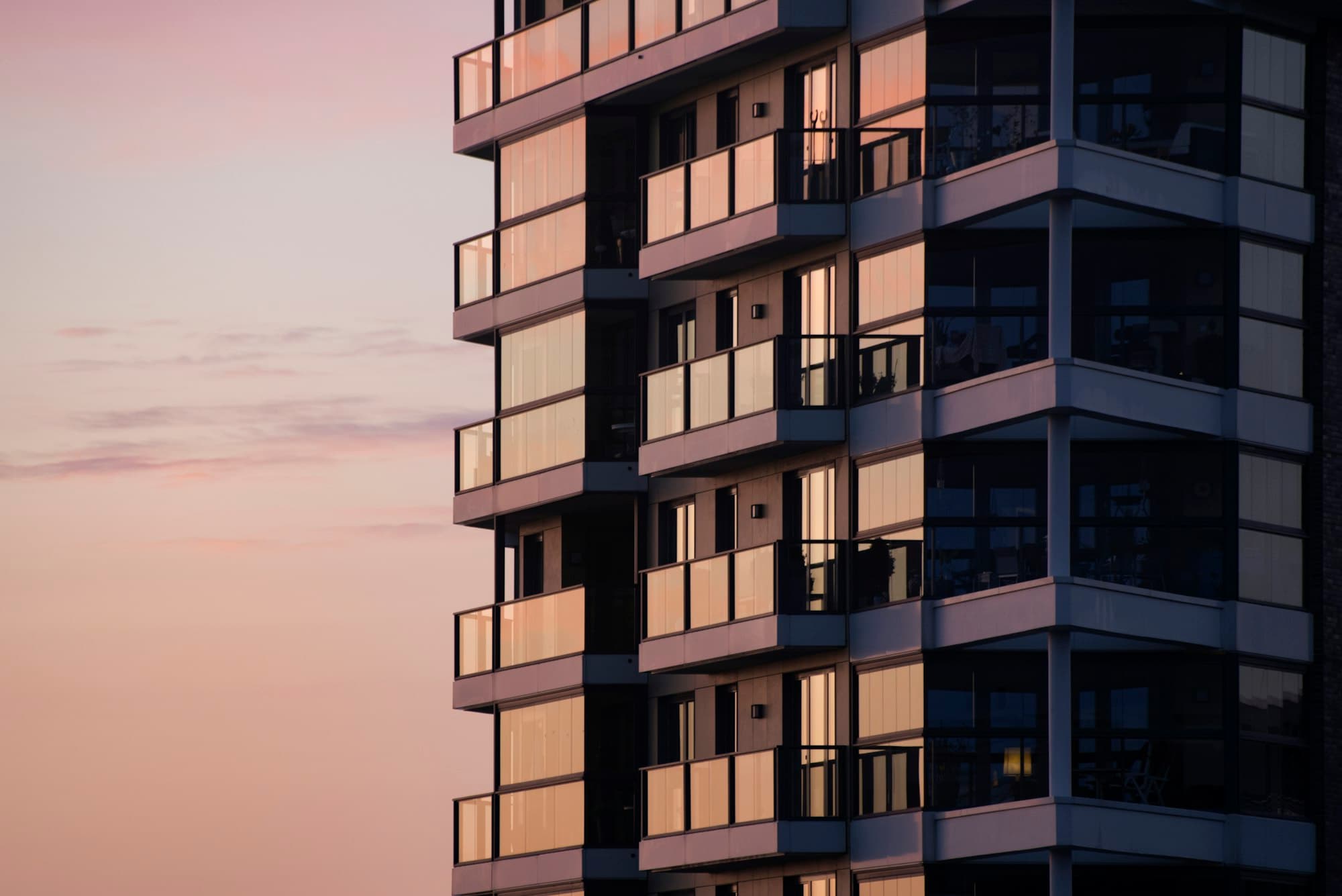 Dusk light on a residential balcony stack